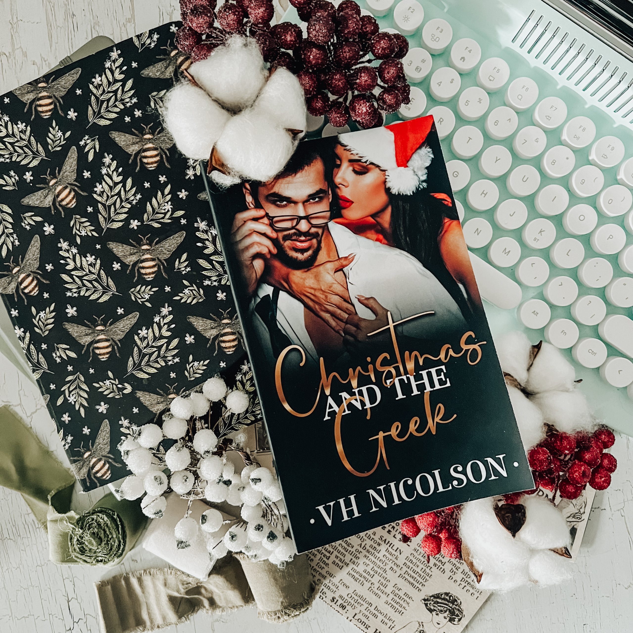 Indulge in the festive allure of Christmas and the Geek by VH Nicholson, a spicy holiday romance filled with passion, secrets, and small-town charm.