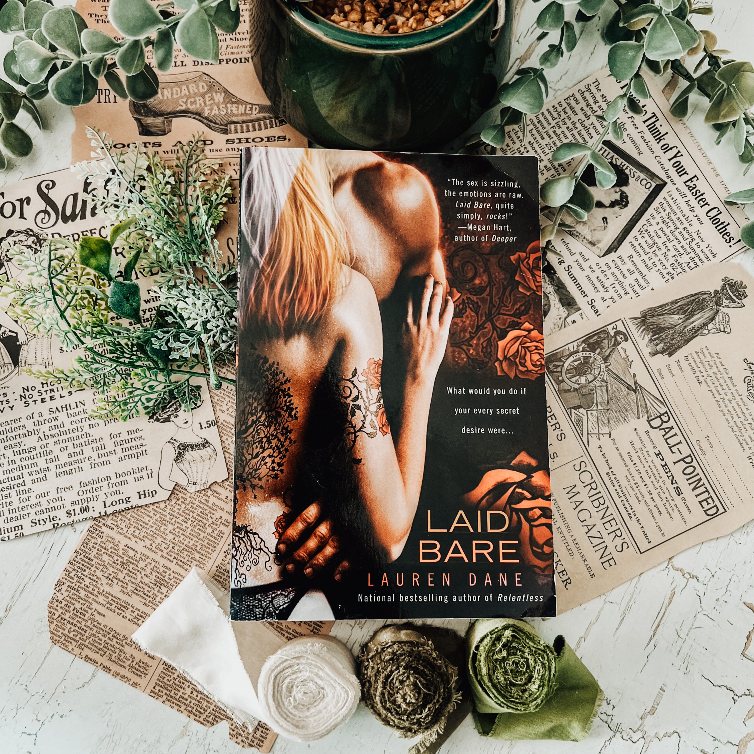 Laid Bare by Lauren Dane gives us a tale of one former rock star's spicy, unconventional romance and deep emotional journey.