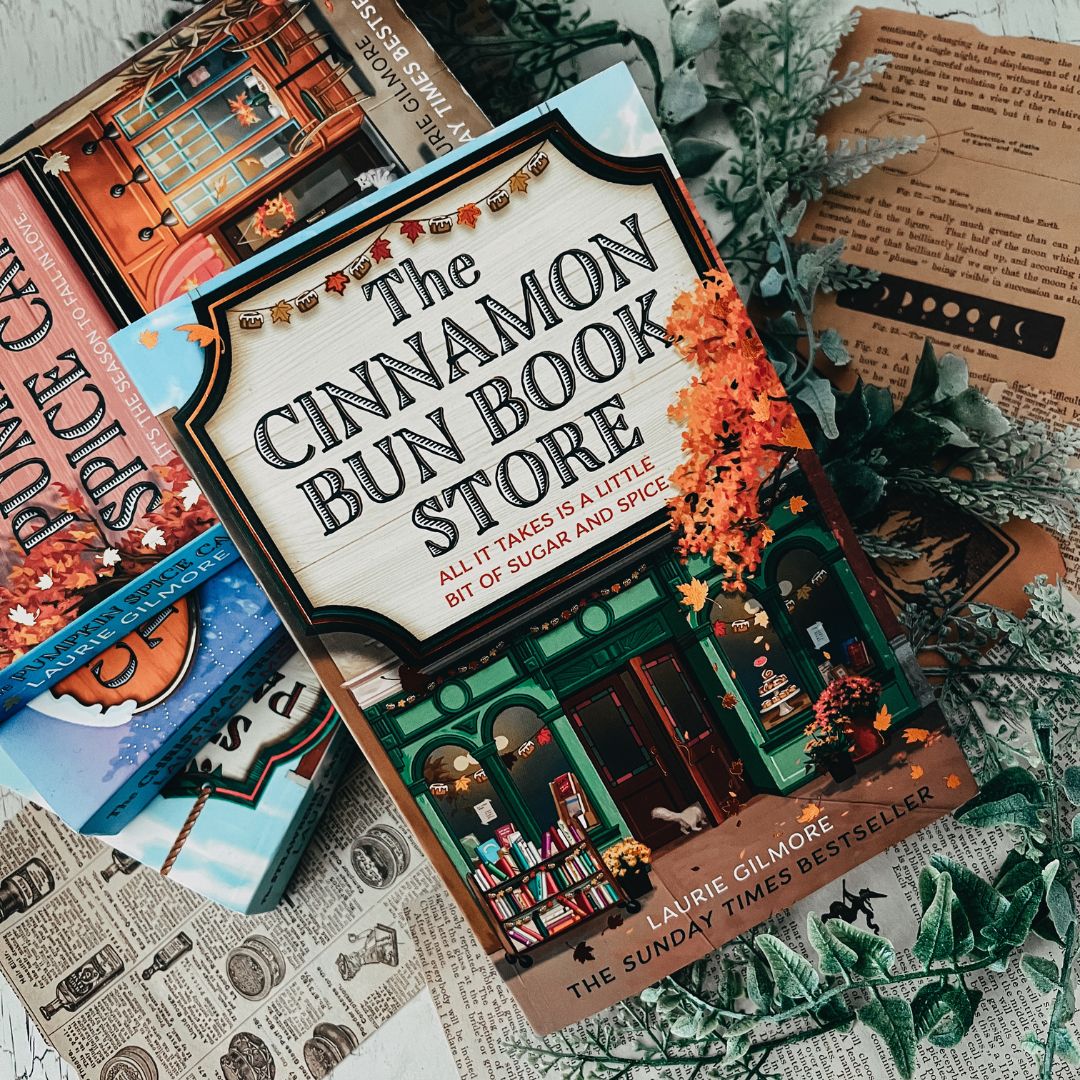 Join Hazel and Noah on a cosy scavenger hunt through Dream Harbor in The Cinnamon Bun Bookstore. Romance, mystery, and cinnamon buns await!