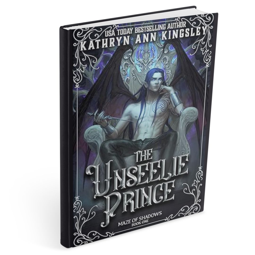 Hardcover of The Unseelie Prince by Kathryn Ann Kingsley, a dark fantasy romance, featuring a pale, blue-haired winged fae prince seated on an ornate throne, holding a blade, with shadowy wings, intricate silver frame details, and a dark purple-black background with gothic typography.
